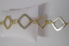 Bracciale Oro Giallo e  Bianco con finitura martellata